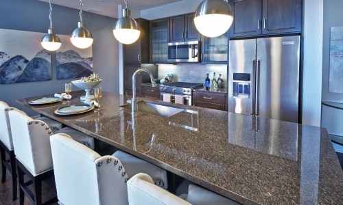 Gourmet kitchen with stainless steel appliances - Make Time for Pure Comfort